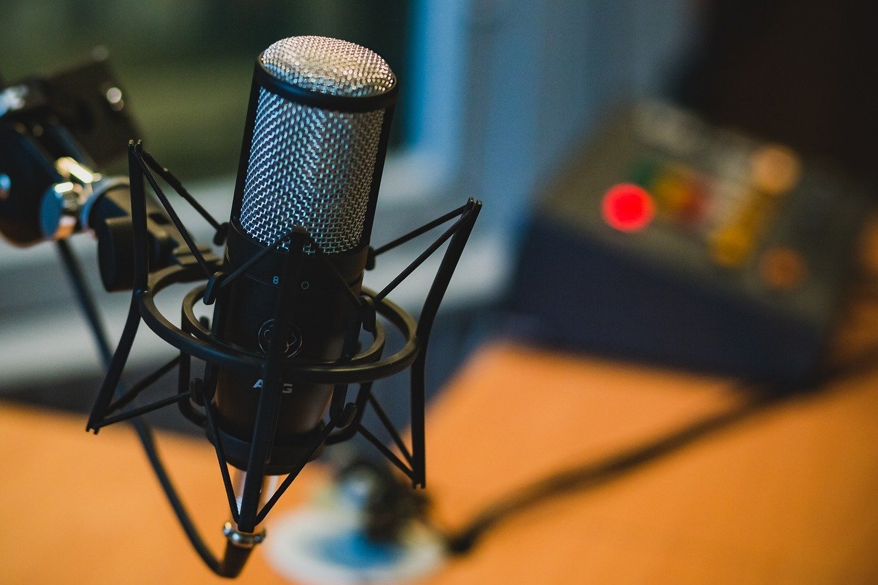 Studio microphone on a podcast desk